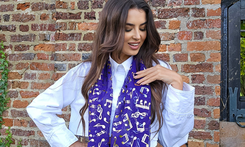 Chic Musical Note Scarf Styled with a Classic White Shirt