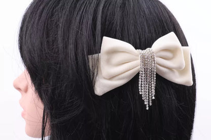 Double velvet bow knotted diamante chain